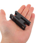 Detachable Door Hinges With Integrated Lock Mechanism For Heavy Duty Cabinets And Garage Doors In Black Zinc Alloy Barrel Style shown in hand