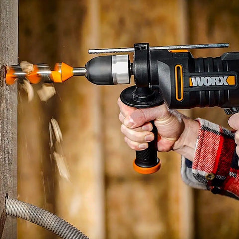 Heavy Duty 600 Watt Impact Drill Driver With 13 Mm Keyless Chuck And Variable Speed Control in action drilling wood.