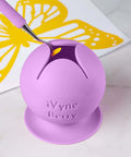 Front view of purple iVyne Berry vinyl weeding scrap collector with suction base and tool slot.