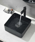 Sleek Matte Black Rectangle Vessel Sink 14 By 14 Inch Above Counter Vanity With Porcelain Ceramic Low Water Absorption Acid Resistant Easy To Clean Surface Durable Modern Bathroom Vessel Sink With Black Pop Up Drain.