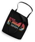 Dragon Boat Tote Bag For Paddlers And Crew Fans Who Live For Racing Regattas with dragon design and colorful text on black fabric