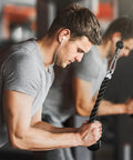 Man using Beefy Heavy Duty Tricep Rope Attachment for Cable Machines Easy Grip Non Slip Rope with Stainless Steel Snap Hook in gym