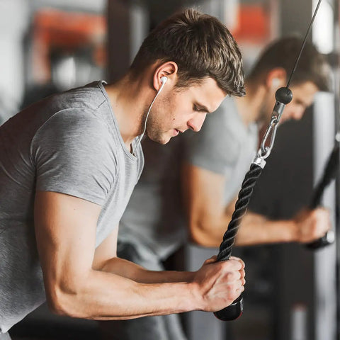 Man using Beefy Heavy Duty Tricep Rope Attachment for Cable Machines Easy Grip Non Slip Rope with Stainless Steel Snap Hook in gym