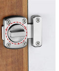 Cast Metal Door Latch Lock Hook Bathroom Right Angle Sliding Gate Bolt installed on wooden door with toggle mechanism.