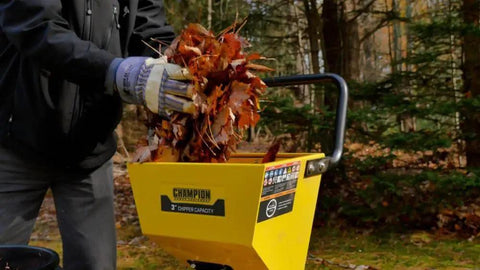 Using Heavy-Duty 3 Inch Portable Chipper Shredder With Collection Bag And 224cc OHV Engine For Fast Yard Cleanup Handles Branches Up To 3 Inches Gas Powered Easy Mobility with fall leaves