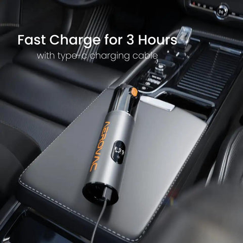 Heavy Duty Cordless Car Vacuum With 16000Pa Kickass Suction And HEPA Filter Handheld Detailer With Led Display Plus Dual Vacuum Blower Modes For Slick Auto Whip Cleanup on car console with type-c charging cable.