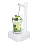 Desktop Water Bottle Dispenser With 7 Stage Adjustable Pump And Anti Slip Base in use pouring water into glass with lime