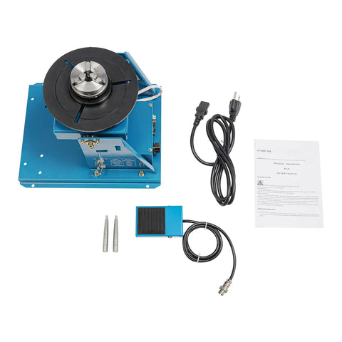 Heavy Duty Rotary Welding Positioner Turntable on a blue base, includes foot pedal, power cable, and manual for metalwork tasks.