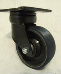 Badass 6 Inch Polyurethane Caster Pack Featuring 2 Swivel And 2 Rigid Drop Forged Kingpinless Build 1300 Lbs Load Each Sealed Bearings Smooth Glide No Mess Maintenance Heavy Duty Towing swivel caster with black wheel and mount plate