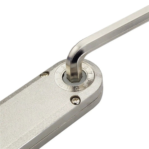 Close-up of Built Tough Hydraulic Kitchen Cabinet Hinge with adjustment tool in metal, showing precise settings.