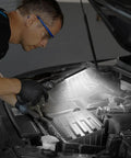 Mechanic using Must-Have Rechargeable LED Work Light For Mechanics With Magnetic Base And Hook on car engine at night