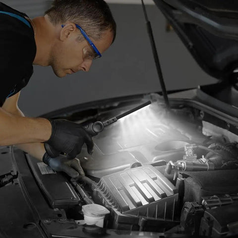 Mechanic using Must-Have Rechargeable LED Work Light For Mechanics With Magnetic Base And Hook on car engine at night