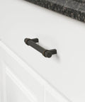 Oil Rubbed Bronze Straight Bar Cabinet Pull 6.63 Inch Length, 5 Inch Hole Center installed on white cabinet drawer