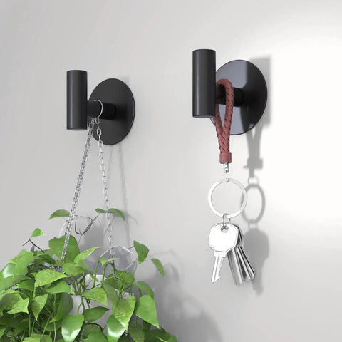 Self-Adhesive Rust-Resistant Stainless Steel Coat Hooks Heavy-Duty No-Drill Wall Hangers for Towels Robes Coats Hats Black 2 Pack Ideal for Bathrooms Kitchens and Hotels holding plant and keys