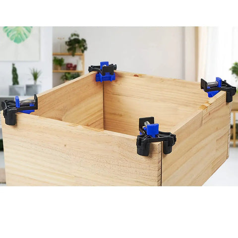 90 Degree Angle Clamps Set Of 4 For Woodworking shown on wooden corner with blue clamps