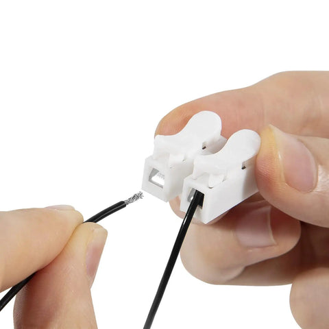 Plug And Play VCM Disable Harness For Honda 3.5L V6 Engines showing white connectors with black wires during installation.