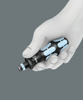 Kraftform Kompakt 60 Stainless 17 Piece Screwdriver Set handle with interchangeable blades in a hand demonstration.