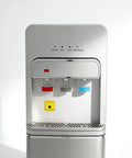 Front view of Bottom Loading Water Cooler Dispenser For 5 Gallon Bottle With Three Temperature Settings Cold Warm And Hot Child Lock Indicator Light No Fuss Easy Bottle Loading Ideal For Home Office Dorms Apartment Silver showing three spouts and indicator lights.