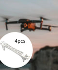 4 Piece Quadcopter Frame Kit With Nylon Construction, Easy Install, image of white drone frame arm with quadcopter in background