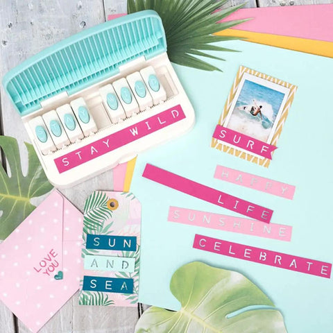 Word Punch Board For Scrapbooking And Card Making Dope Letter Punch Set With 26 Letters shown with colorful punched words on paper