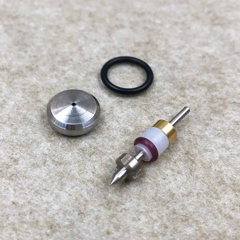 Waterjet on/off valve repair kit components: metal valve stem with brass collar, white/purple insert, and black O-ring.