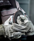 Worker using Pro Grade 6-Inch Angle Grinder With 10,000 RPM And 12 Amp Motor, Non-Locking Paddle Switch, Built-In Brake