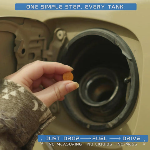 Person placing a fuel tab into car tank, showcasing Fuel Additives With 10 Tabs For Cars Clean Gasoline And Diesel Engines Eco Friendly Fuel Injector Cleaner And Stabilizer To Boost Power Sharper Throttle Response Better MPG Smoother RPM Cleaner Emissions Treats Twenty Gallons.