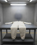 Canvas Sandblasting Suit With Hood Full Body Dustproof Workwear For Grinding And Sanding In Factory Workshops Hardcore Protection And Comfortable Fit Durable Grit Proof Coverall For Maintenance Jobs, beige canvas hooded coverall on table