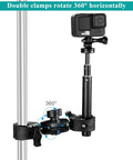 Double Clamp Camera Mount With 360 Degree Arm And 180 Degree Tilt, clamped to a pole holding a camera.