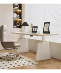 Smooth Rise Electric Sit Stand Desk With Four Memory Presets And A Sleek Slate Surface For A Top Tier Home Office Setup, in modern office with chair.
