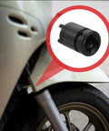 Heavy Duty Four Claw Lug Nut Extractor Kit For Damaged Stuck Bolts Saves Time On Tough Repair Jobs With Precision Splitter Tool Design For Real Mechanics Who Need Results Fast black steel extractor on car wheel
