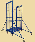 Built Like A Tank Electric Mobile Scaffold Lift With Smooth Remote Controls For Hassle Free Indoor Outdoor Access And Heavy Equipment Hauling On Daily Job Sites Today, blue steel frame, rolling base, wire pulleys.