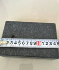 Pro Grade Granite Comparator Base 150mm By 100mm By 50mm With Digital Indicator showing measurement with tape