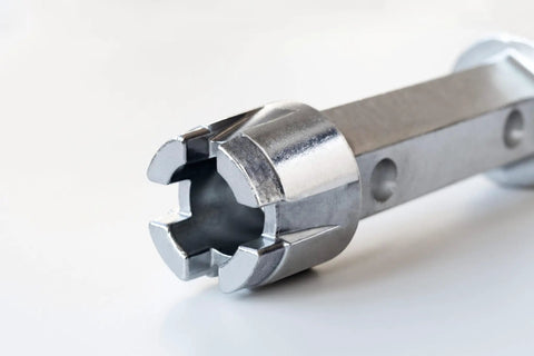 Tub Drain Remover Wrench Dual Ended Dumbbell Tool For Bath Drains Beefy Heavy Duty Aluminum close-up showing dual-ended design.