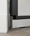 Close-up of pivot hinge on 36 In By 84 In Full Lite Opaque Frosted Glass Interior Pivot Door With Black Steel Frame And Pivot Hinge Hardware Kit