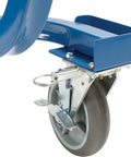 Close-up of the brake wheel of the Hardcore 8 Foot Mobile Industrial Cooling Barrel Fan With Six Aluminum Blades And Variable Speed EC Motor Cranking Out Lightning Fast 65000 CFM Airflow To Kill Summer Heat Plugs Straight Into Any Standard 120V Receptacle.