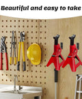Eight Pack Jack Stand Wall Mount Organizer for hanging heavy duty garage hooks displayed in a workshop setting with tools.