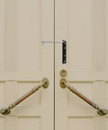 Automatic Door Closer For Doors And Gates With Silent Design Easy Install Heavy Duty Stainless Steel Construction shown on beige doors