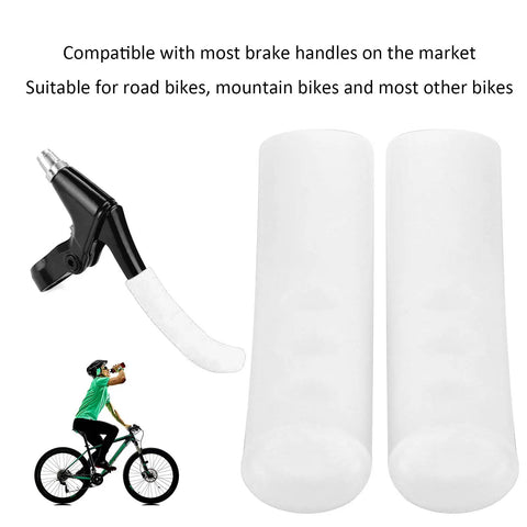 Pair of white silicone brake lever covers for road and mountain bikes shown with a brake lever.