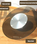 Big Round Glass Lazy Susan Turntable For Dining Table with aluminum base, quiet bearings, 90 cm tabletop shown from side angle
