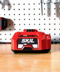 Power Up Fast PWR Jump 150W Charger For 40V Batteries, 15 Minute Quick Charge With LED Status Lights on workbench