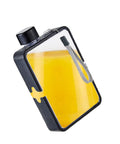 Flat Square Water Bottle For On The Go Hydration, Leak Proof And Drop Proof, shown with black cap and wrist strap filled with yellow liquid