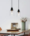 Slick Five Point Five Inch Seeded Glass Mini Pendant Light Featuring Badass Black Metal Hanging Fixtures For Kitchen Island And Dining Room with flowers.