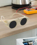 High Grade Welding Goggles And Safety Glasses Featuring Adjustable Impact Resistant Lenses For Gas Arc Cutting Grinding Hardcore Shop Job Crew Approved Must Have Gear on a workbench.
