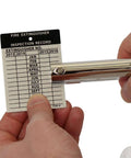 Heavy Duty Handheld Workhorse Single Hole Punch With 1/8 Inch Punch And 2 Inch Reach in use on inspection record card