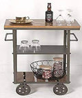 Heavy Duty Metal Industrial Rolling Cart With Three Roomy Shelves For Kitchen Storage Bar Setup And Home Organization Top Shelf Iron Frame Wood Finish Smooth Glide Utility Trolley with drinks and glasses.