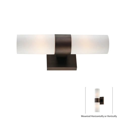 Sleek Dope Bronze Glass Reversible Wall Sconce For Bathrooms Damp Rated Vanity Light 13 Inch High By 4 Inch Wide E26 Base 120W Max Two 60W Bulbs