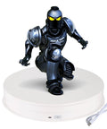 12 Inch Motorized Rotating Turntable Display Stand With 360 Degree Spin For Product Photography shows black action figure on smooth base.