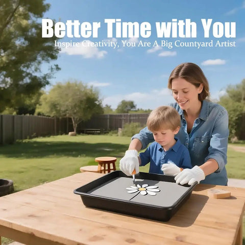 Adult and child crafting with square stepping stone mold on outdoor table, smiling and engaged.