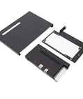 Game Changer External Graphics Dock For Laptops Featuring USB 4 And Thunderbolt 4 Support For PCIe X16 Expansion. Black metal parts arranged.